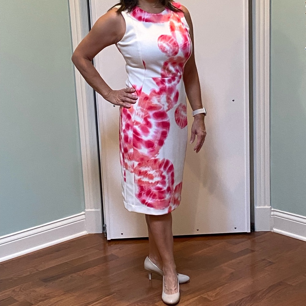 Like new Calvin Klein white dress beautiful pink flowers. Sz 6 gold back zipper